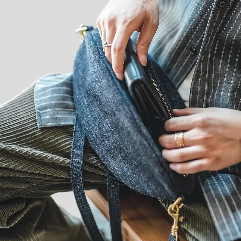 Denim football crossbody bag