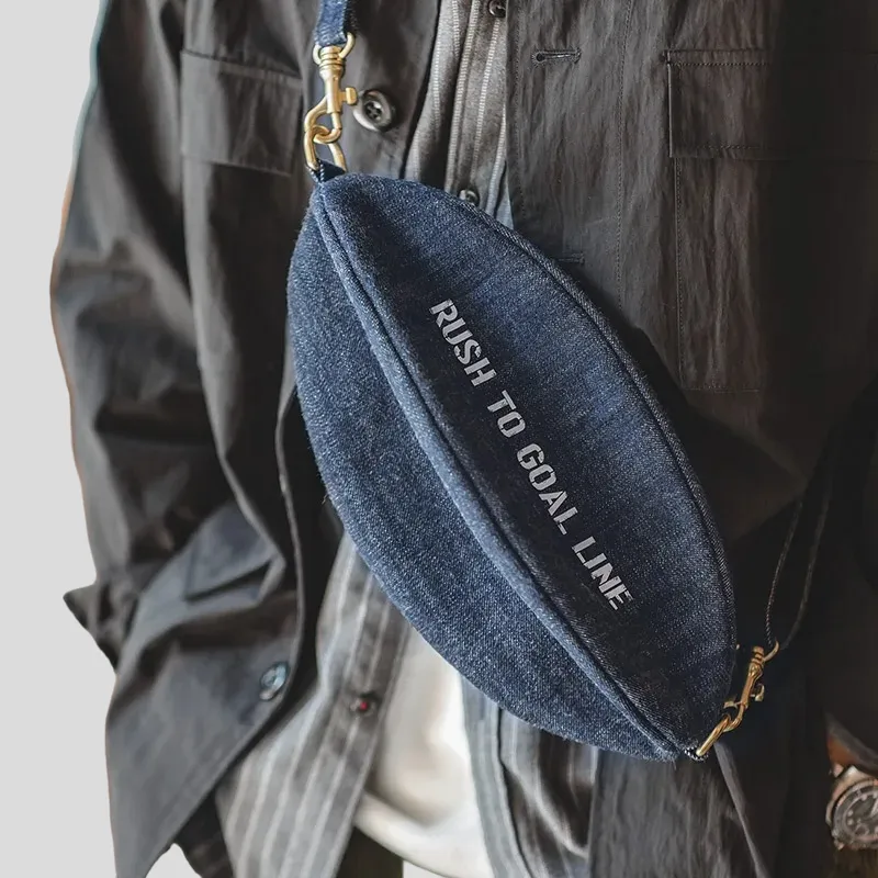 Denim football crossbody bag