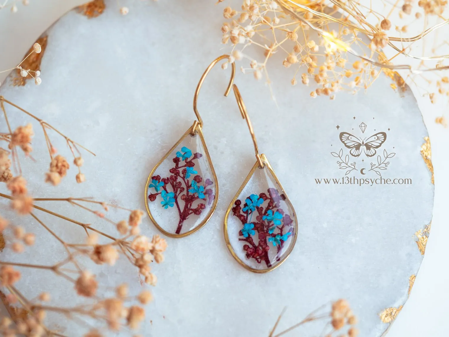 Teardrop shape earrings with Real pressed red and blue flowers