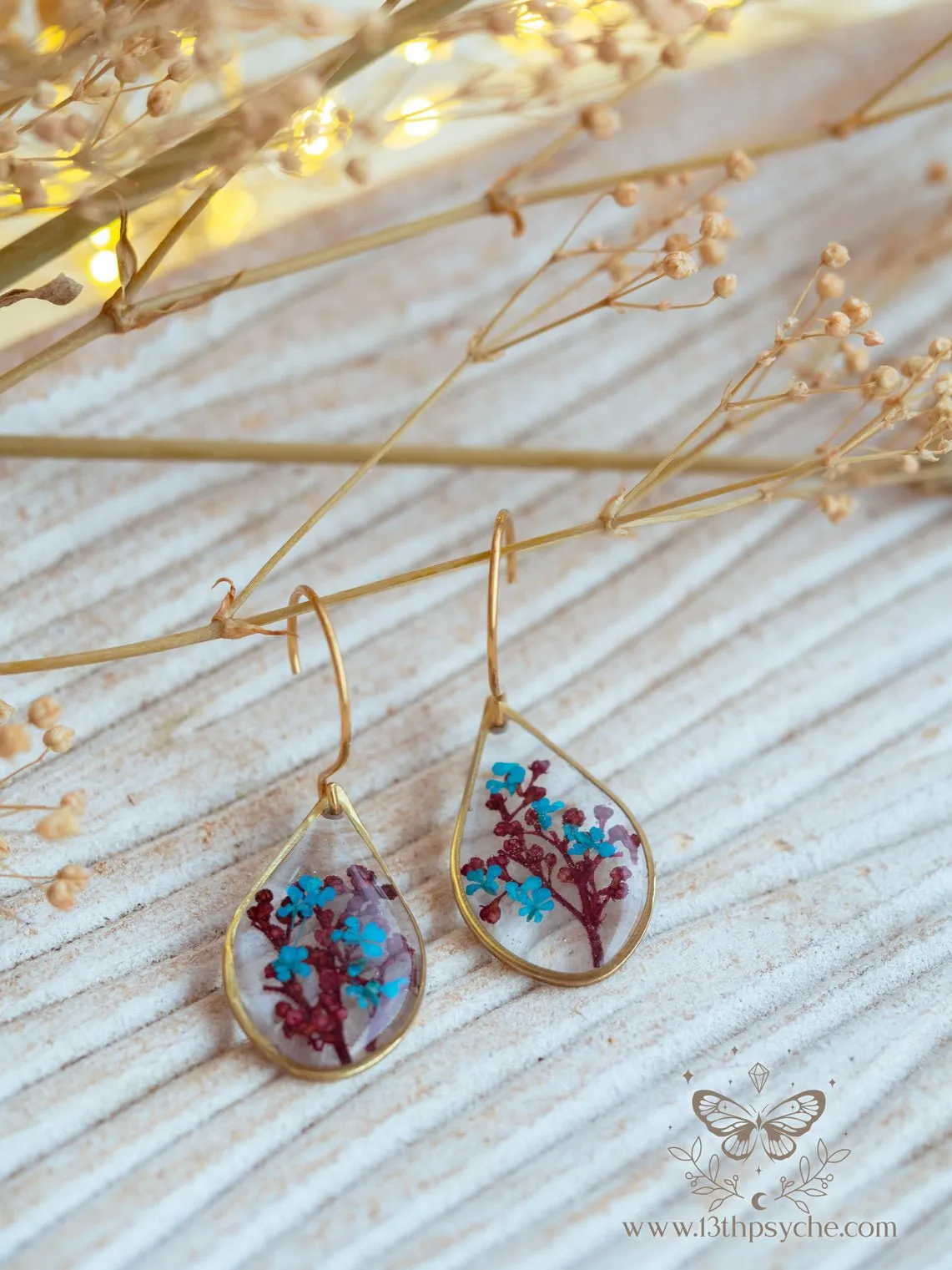 Teardrop shape earrings with Real pressed red and blue flowers