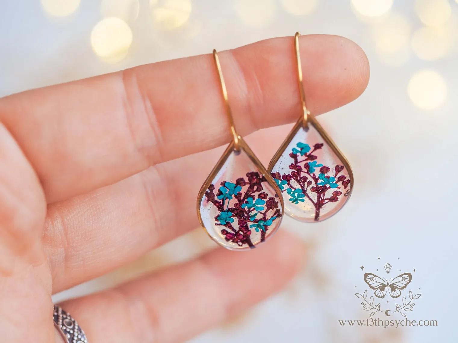 Teardrop shape earrings with Real pressed red and blue flowers