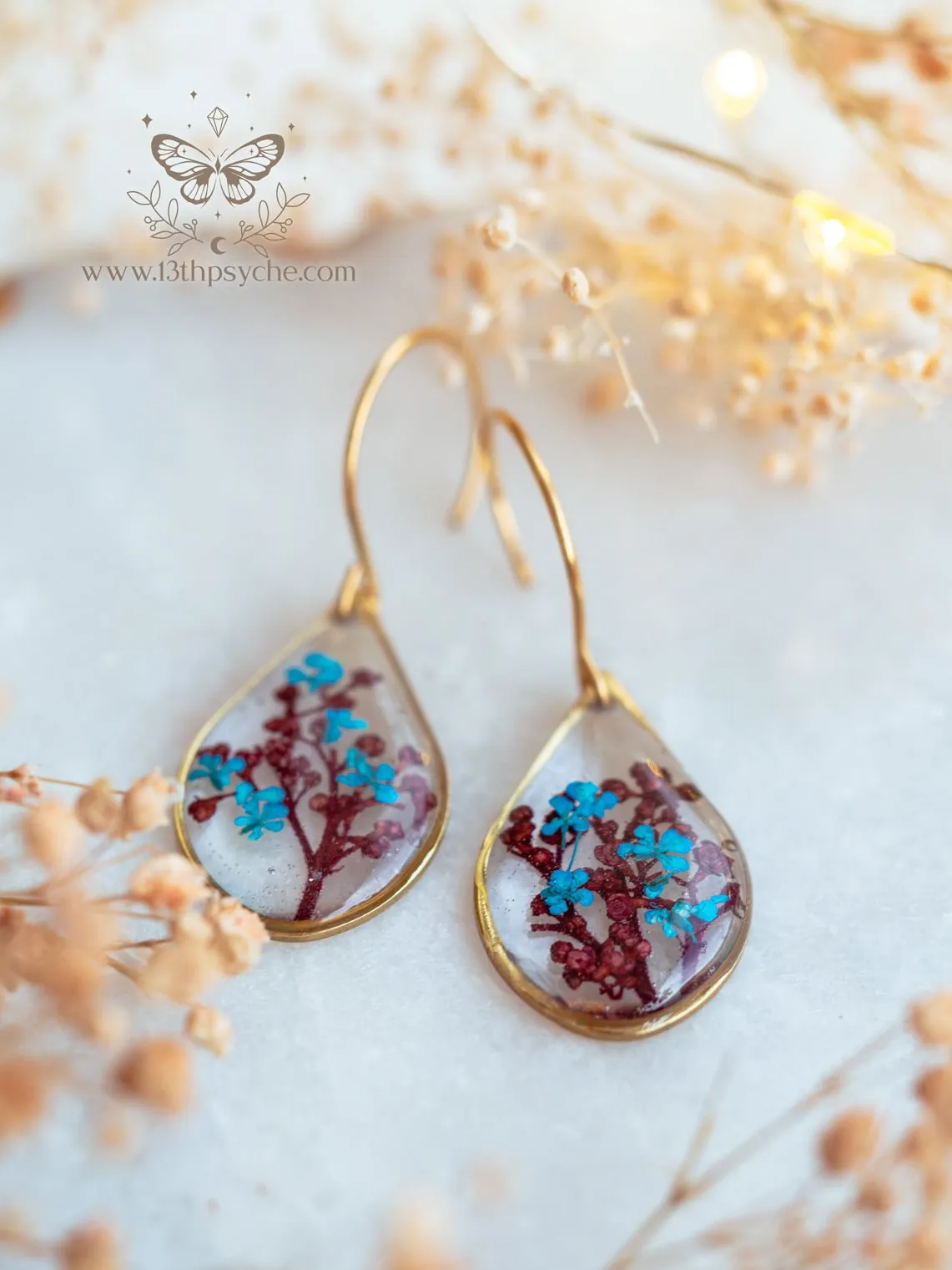 Teardrop shape earrings with Real pressed red and blue flowers